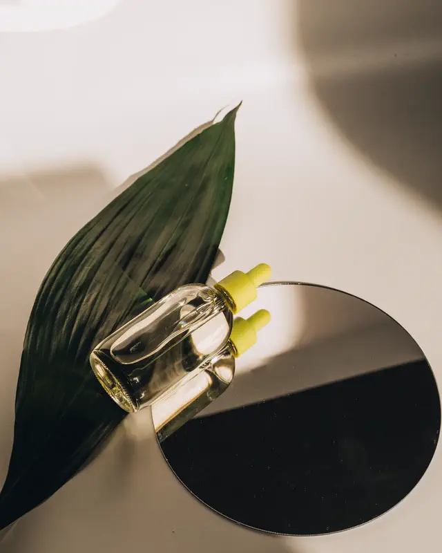 Dropper bottle on a mirror