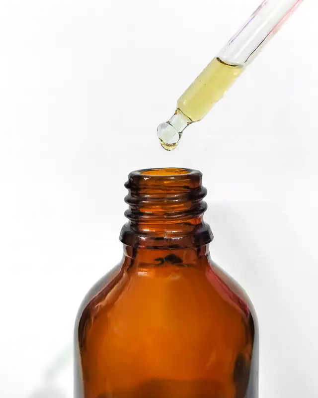Dropper dosing a bottle